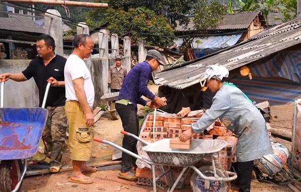 A group of people working outside
AI-generated content may be incorrect.